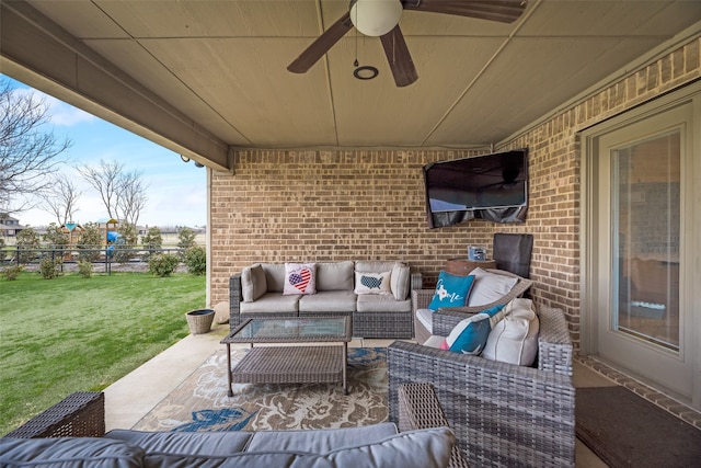 view of patio featuring an outdoor living space and ceiling fan