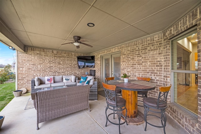 view of patio / terrace featuring ceiling fan and outdoor lounge area