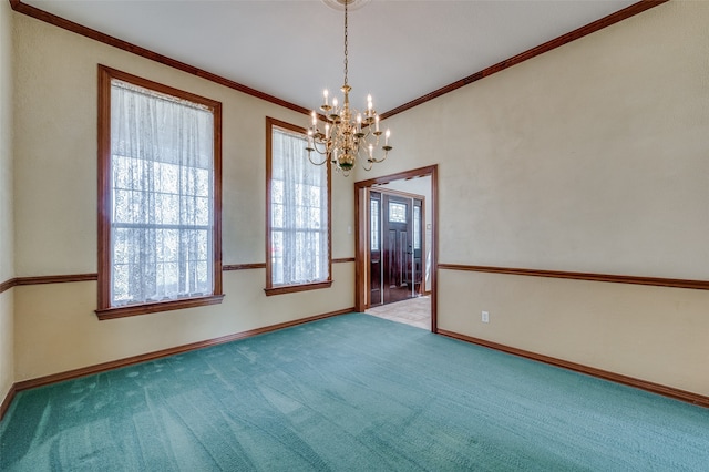 unfurnished room with crown molding, carpet, and a notable chandelier