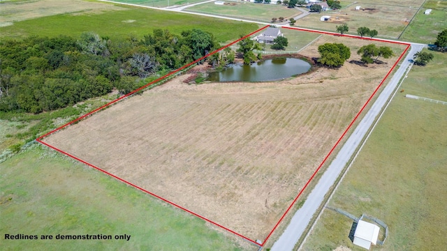 10200 Zipper Rd, Pilot Point, TX 76258 - aerial view of property and surrounding area with property boundaries highlighted and a nearby body of water