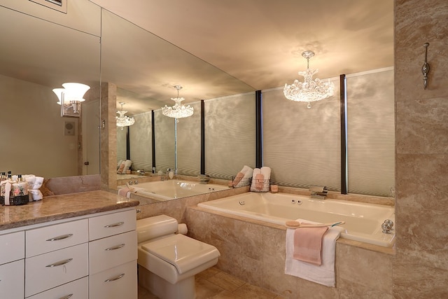 bathroom with toilet, tiled tub, a notable chandelier, and vanity