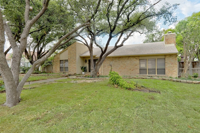 view of front of house with a front yard