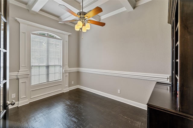 unfurnished room featuring coffered ceiling, crown molding, dark hardwood / wood-style flooring, beamed ceiling, and ceiling fan