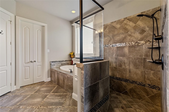 bathroom featuring plus walk in shower