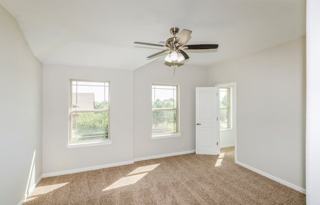 carpeted empty room with ceiling fan