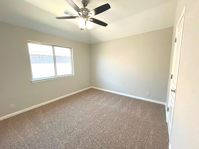 spare room with carpet flooring and ceiling fan