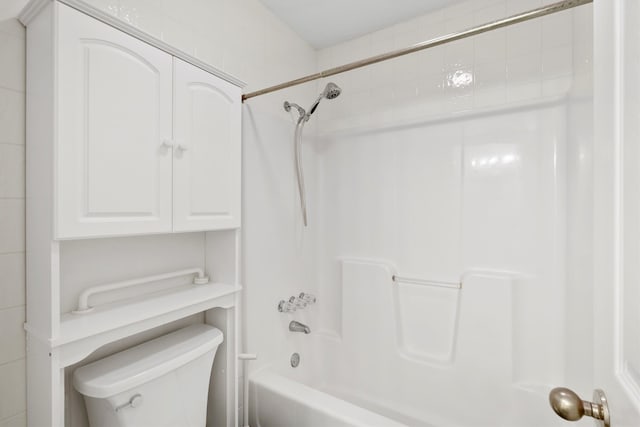 bathroom with a bath, wood-type flooring, and sink