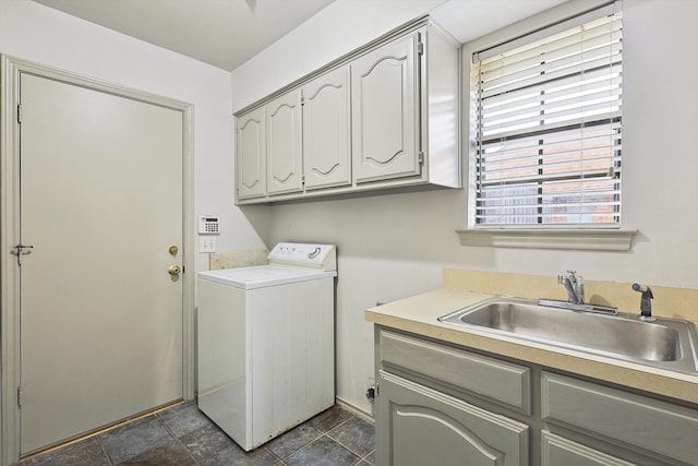 laundry room with washer / clothes dryer, cabinets, and sink