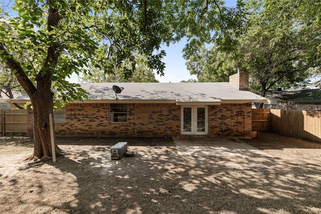 back of property featuring french doors