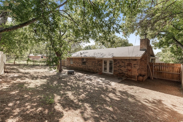 back of house with french doors