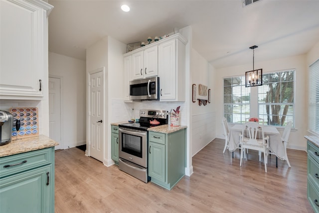 kitchen with white cabinetry, light hardwood / wood-style flooring, green cabinetry, an inviting chandelier, and appliances with stainless steel finishes