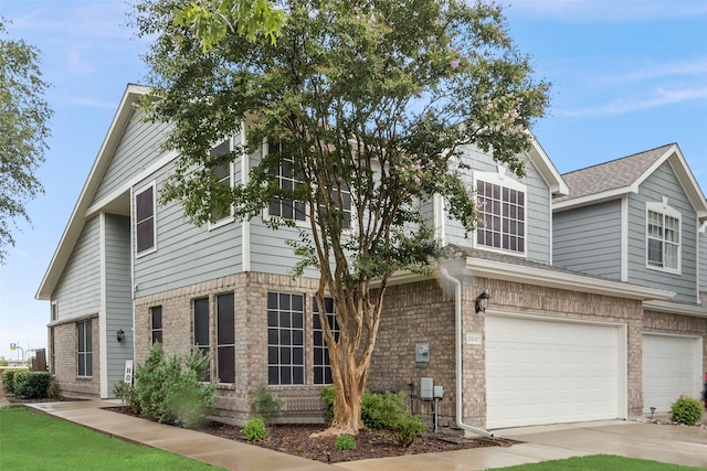 view of front of property with a garage