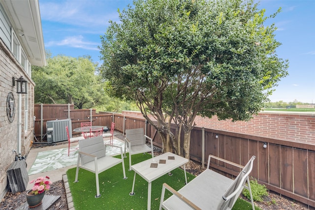 view of patio featuring central AC