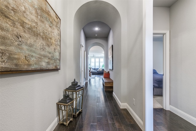 hall featuring dark wood-type flooring