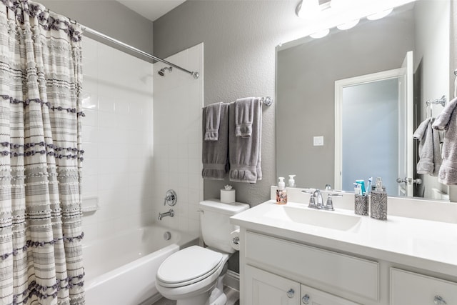 full bathroom featuring vanity, toilet, and shower / bathtub combination with curtain