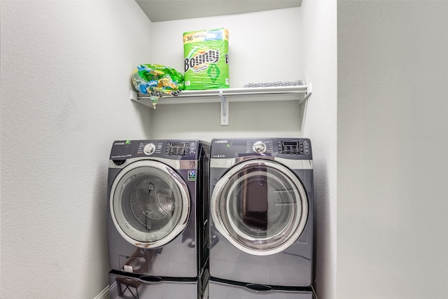 laundry room featuring independent washer and dryer