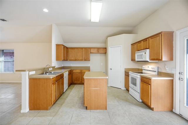 kitchen with lofted ceiling, a kitchen island, sink, light tile patterned floors, and white appliances