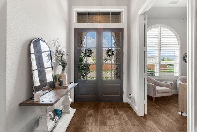 interior space featuring french doors and wood-type flooring