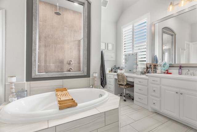 bathroom with plus walk in shower, vaulted ceiling, and vanity