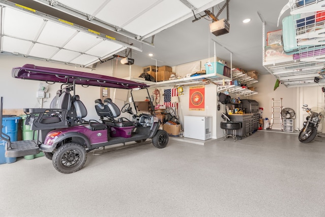 garage featuring a garage door opener