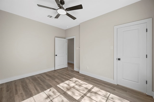 unfurnished bedroom with light wood-type flooring and ceiling fan