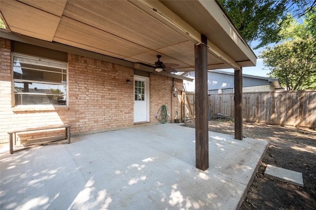 view of patio featuring ceiling fan