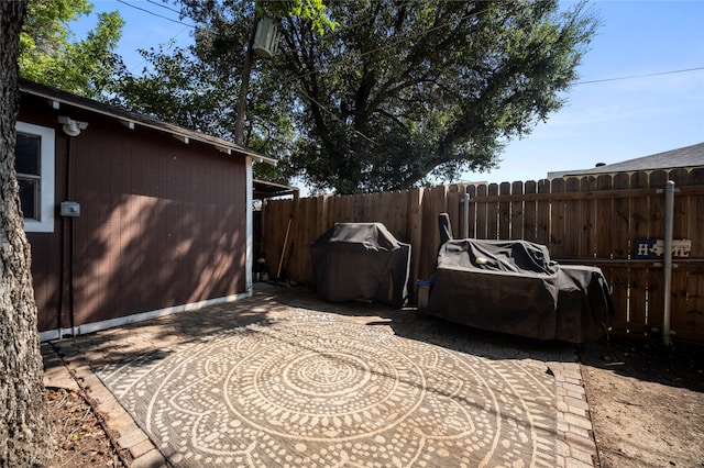 view of patio with a grill