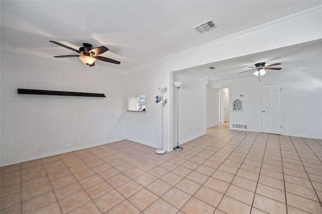 empty room featuring ornamental molding, ceiling fan, and light tile patterned floors