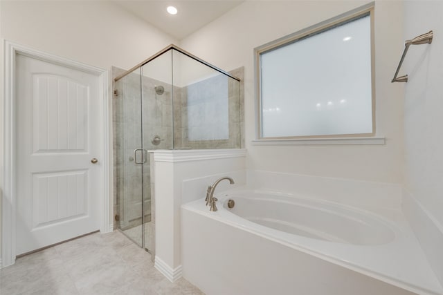 bathroom with independent shower and bath