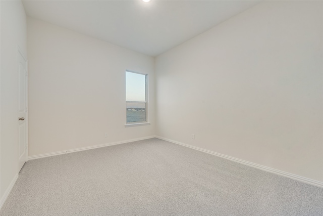 spare room with carpet floors