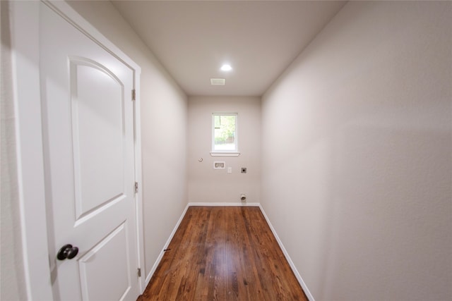 corridor featuring dark wood-type flooring