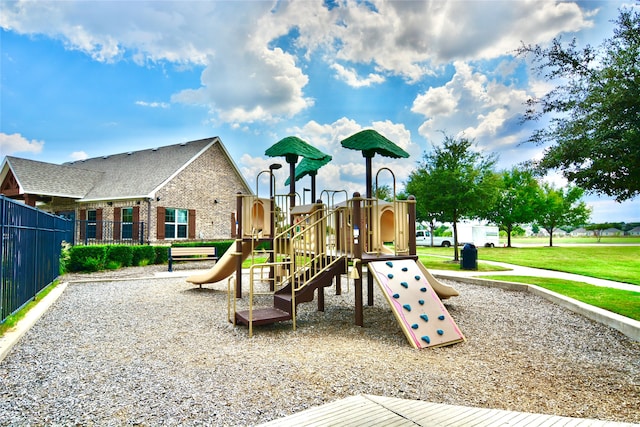 view of jungle gym with a yard