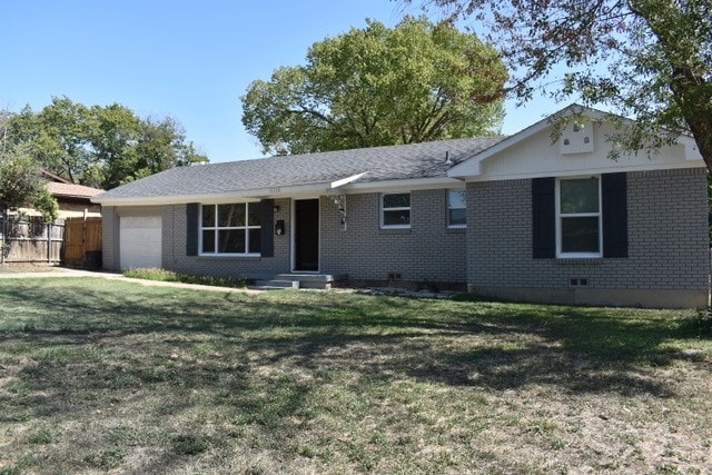 ranch-style home with a front yard