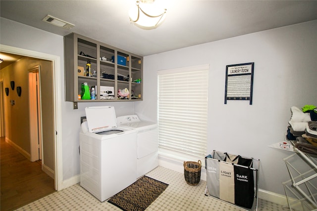 laundry room featuring independent washer and dryer