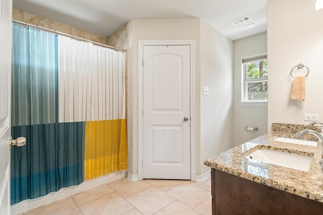 bathroom with vanity, tile patterned flooring, and a shower with shower curtain