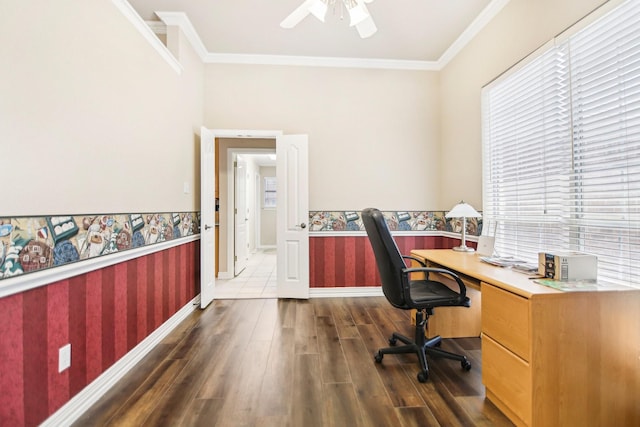 office featuring baseboards, wallpapered walls, a ceiling fan, wood finished floors, and ornamental molding