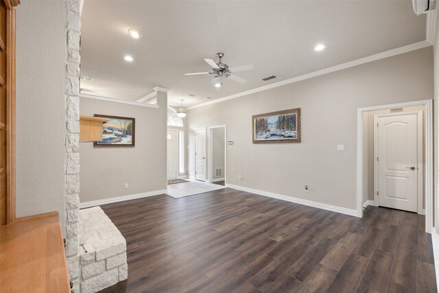 unfurnished living room with dark hardwood / wood-style floors, ceiling fan, and crown molding