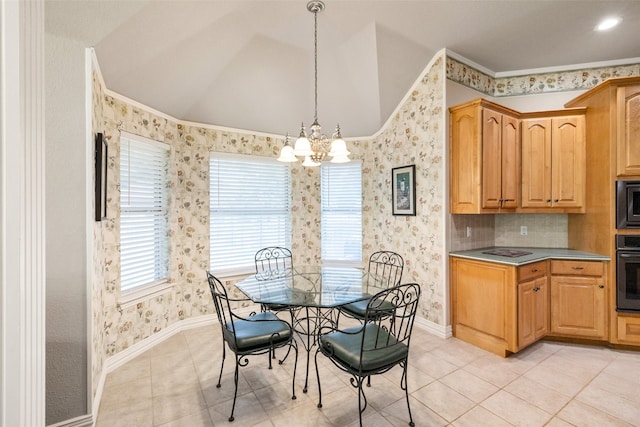 dining area with crown molding, light tile patterned floors, and a chandelier