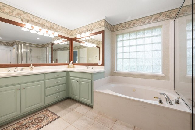 bathroom with tile patterned flooring, vanity, separate shower and tub, and crown molding