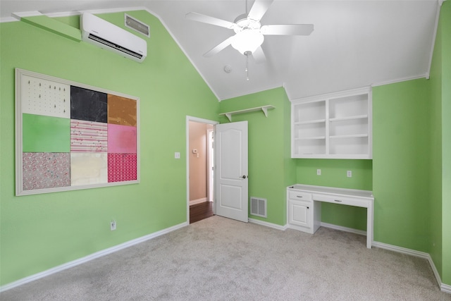 unfurnished bedroom with ceiling fan, light colored carpet, a wall unit AC, and vaulted ceiling