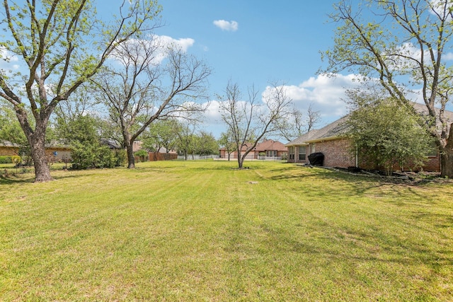 view of yard featuring fence