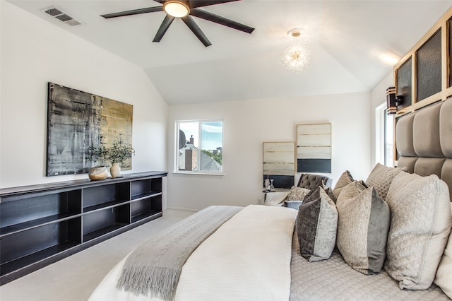 carpeted bedroom with ceiling fan and lofted ceiling