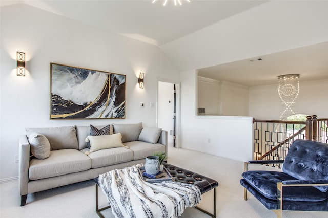 carpeted living room with vaulted ceiling