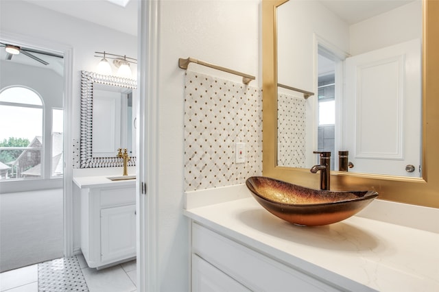 bathroom featuring tile patterned floors and vanity