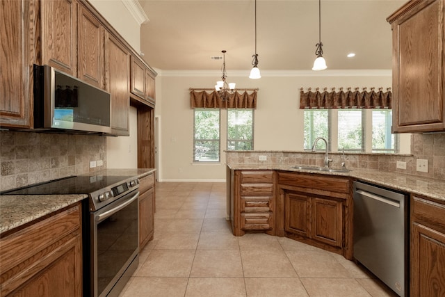 kitchen with light stone countertops, stainless steel appliances, light tile patterned flooring, and sink