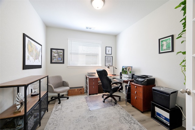 office featuring light hardwood / wood-style floors