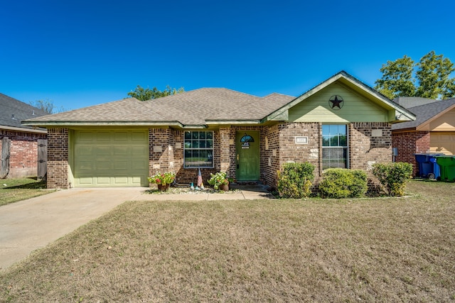 single story home with a front yard and a garage