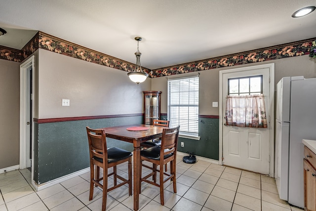 dining room with light tile patterned floors