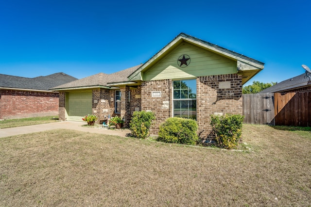 ranch-style house with a garage and a front yard