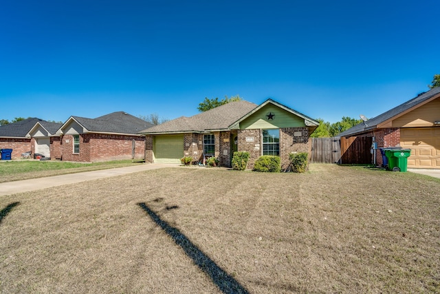 ranch-style home featuring a front yard and a garage